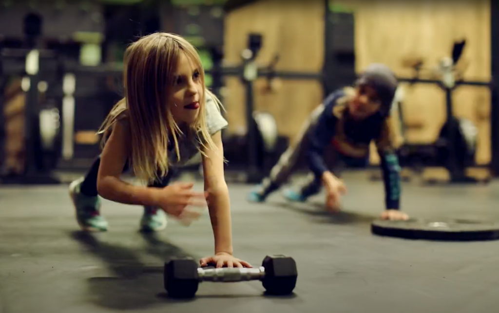Girl exercising with weights