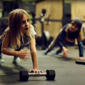 Girl exercising with weights